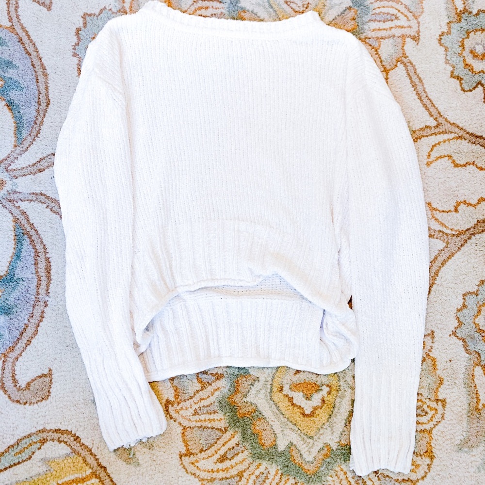 white sweater